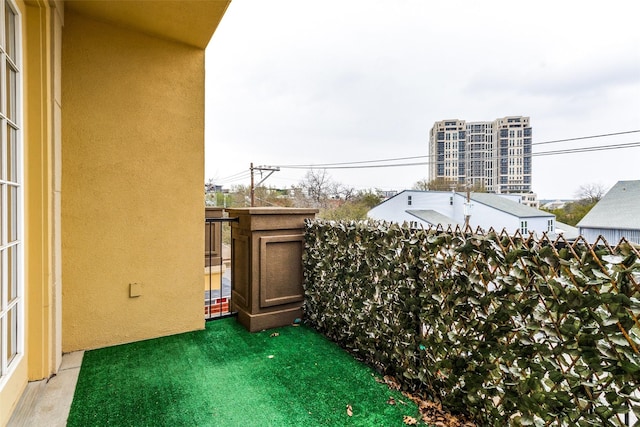 3818 Holland Ave Unit 305, Dallas, TX 75219 - view of yard featuring a balcony