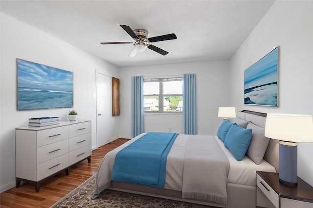 851 Dublin Dr Unit 3, Richardson, TX 75080 - bedroom with wood finished floors, ceiling fan, and baseboards
