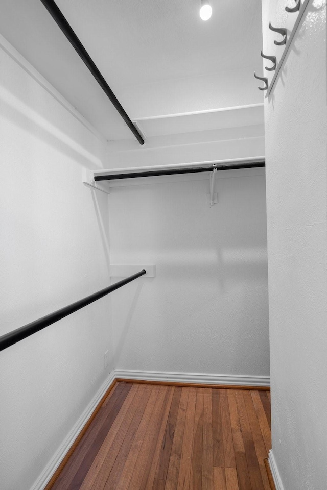 851 Dublin Dr Unit 3, Richardson, TX 75080 - spacious closet with hardwood / wood-style floors