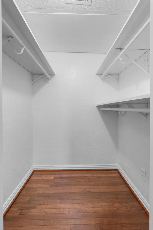 851 Dublin Dr Unit 3, Richardson, TX 75080 - walk in closet with wood finished floors
