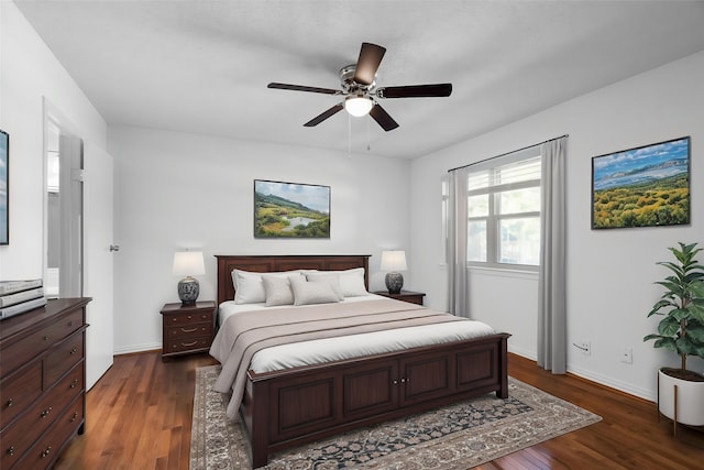851 Dublin Dr Unit 3, Richardson, TX 75080 - bedroom with dark wood-style flooring, baseboards, and a ceiling fan