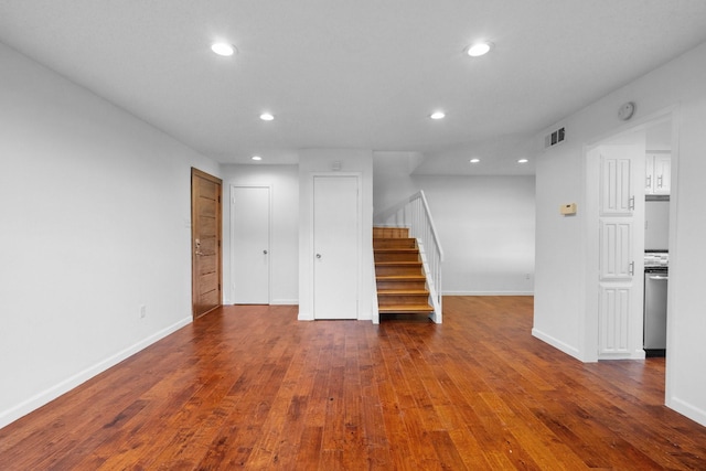 851 Dublin Dr Unit 3, Richardson, TX 75080 - unfurnished living room with stairway, recessed lighting, hardwood / wood-style flooring, and baseboards