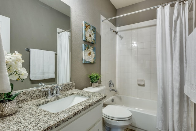 8205 San Bernard Trl, Mckinney, TX 75071 - bathroom with a textured wall, shower / tub combo with curtain, vanity, and toilet