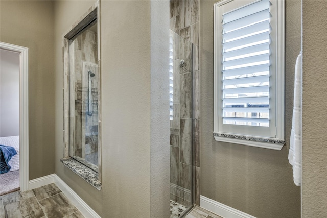8205 San Bernard Trl, Mckinney, TX 75071 - bathroom featuring a stall shower