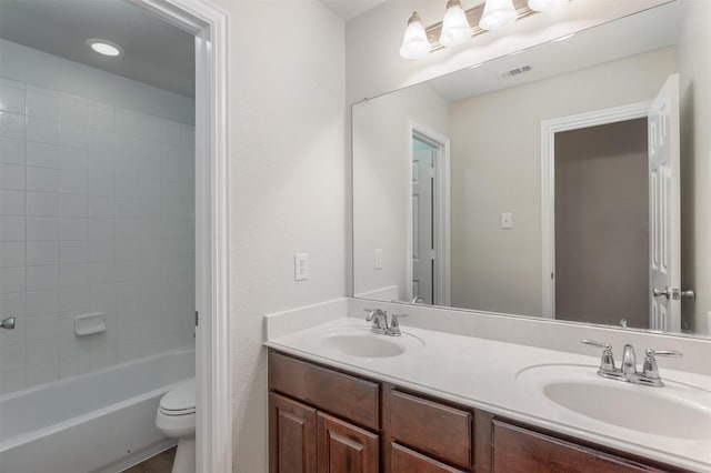 5208 Birchwood Dr, Mckinney, TX 75071 - bathroom featuring a sink, visible vents, toilet, and double vanity