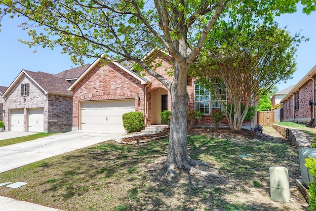 5208 Birchwood Dr, Mckinney, TX 75071 - view of front of house with brick siding, fence, a garage, and driveway