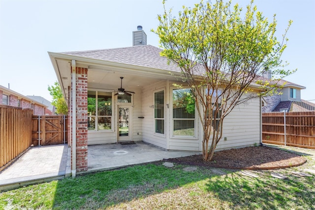5208 Birchwood Dr, Mckinney, TX 75071 - rear view of property featuring ceiling fan, a patio, fence, a gate, and a chimney