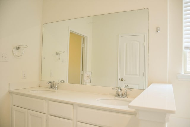 bathroom with double vanity