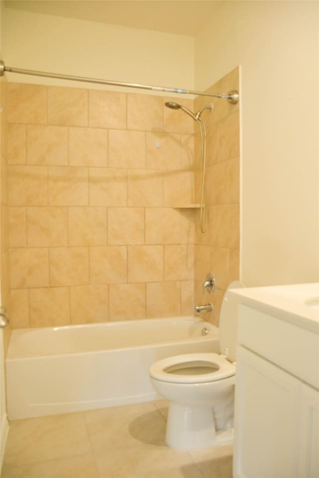 bathroom with toilet, tile patterned floors, shower / bathtub combination, and vanity