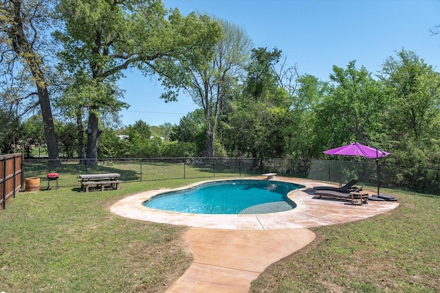 view of pool with a yard, a patio, a fenced in pool, and a fenced backyard