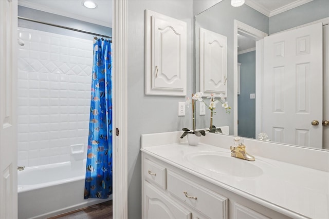 full bathroom featuring crown molding, shower / bathtub combination with curtain, vanity, and wood finished floors