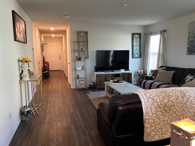 345 Wishbone Ln, Fort Worth, TX 76052 - living room with dark wood-style floors, baseboards, and visible vents