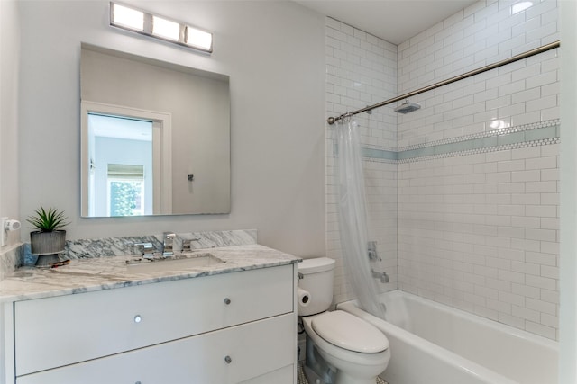bathroom featuring toilet, shower / bathtub combination with curtain, and vanity