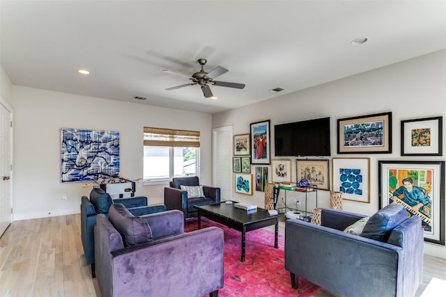 living area featuring visible vents, a ceiling fan, recessed lighting, and light wood-type flooring
