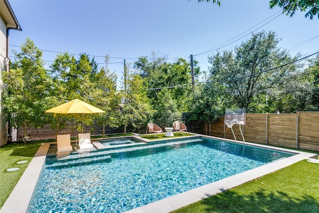 view of swimming pool with a fenced in pool, a fenced backyard, and an in ground hot tub