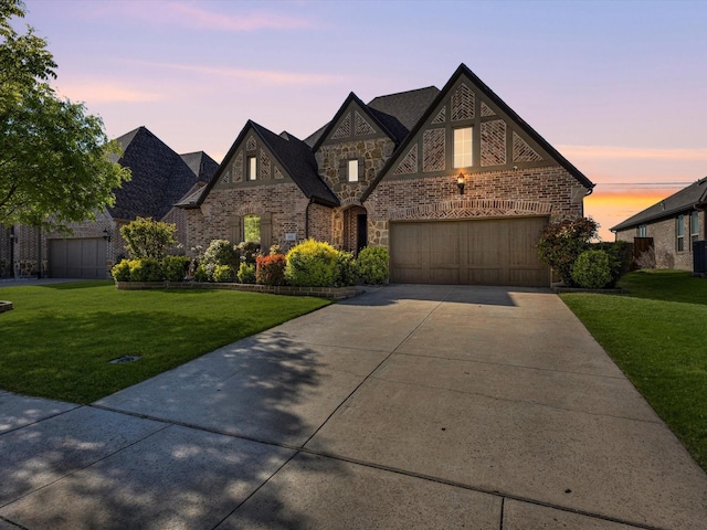 951 Highpoint Way, Roanoke, TX 76262 - view of front facade featuring concrete driveway, a front yard, stone siding, and a garage
