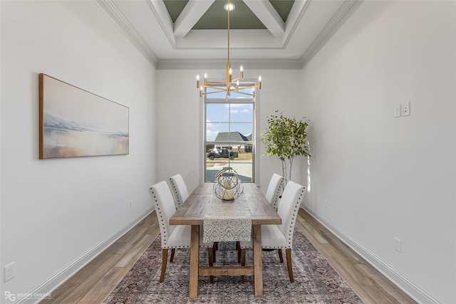 531 Cocodrie Dr, Bossier City, LA 71112 - dining area featuring a notable chandelier, crown molding, beamed ceiling, light wood-style flooring, and coffered ceiling