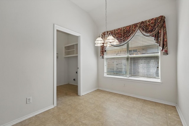 unfurnished dining area with a chandelier, vaulted ceiling, and baseboards