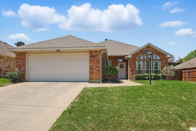 ranch-style home featuring brick siding, concrete driveway, an attached garage, and roof with shingles