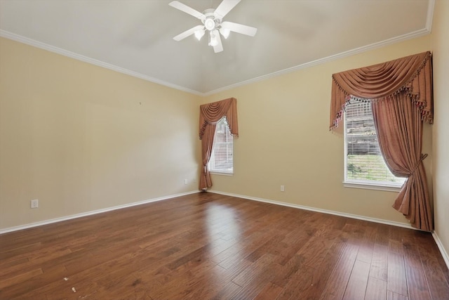 unfurnished room featuring a ceiling fan, wood-type flooring, ornamental molding, and baseboards