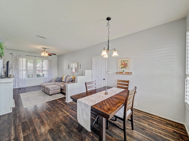 907 Chickesaw Ln, Wylie, TX 75098 - dining area featuring dark wood-style floors, ceiling fan, and a chandelier