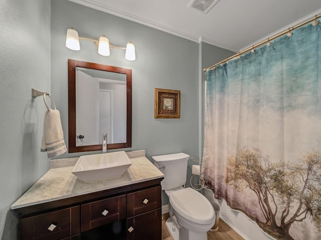 907 Chickesaw Ln, Wylie, TX 75098 - bathroom featuring ornamental molding, wood finished floors, vanity, toilet, and baseboards