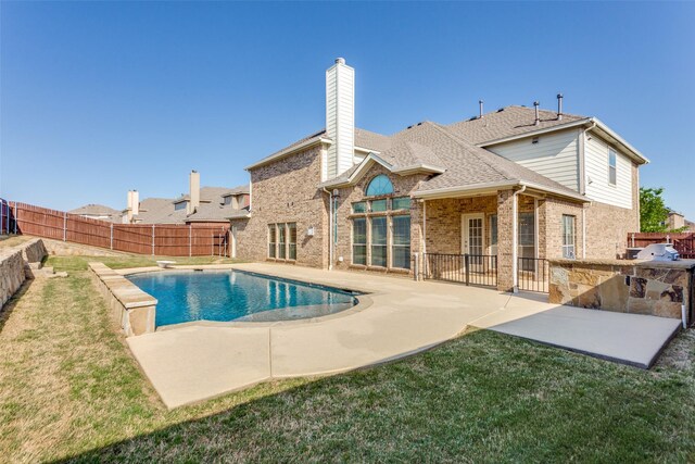 1348 Meadowview Dr, Kennedale, TX 76060 - view of swimming pool with a lawn, a fenced in pool, and a fenced backyard