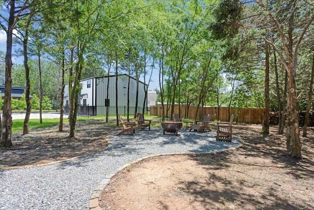 TBD Holland St, Pottsboro, TX 75076 - view of yard with a fire pit and fence