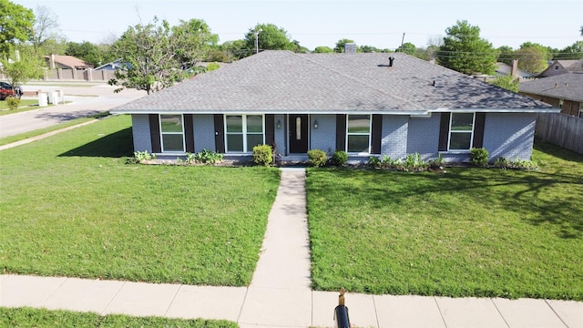 3321 Lynbrook Dr, Plano, TX 75075 - ranch-style home with roof with shingles, a front lawn, and brick siding