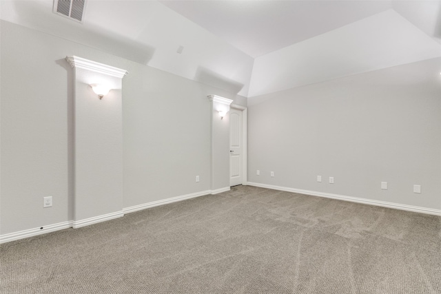 8321 Burnley, The Colony, TX 75056 - carpeted spare room featuring baseboards and vaulted ceiling