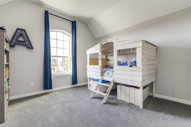 8321 Burnley, The Colony, TX 75056 - carpeted bedroom featuring vaulted ceiling and baseboards