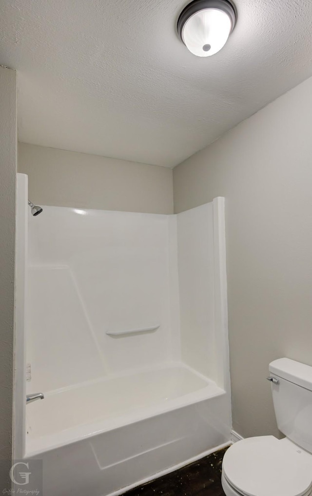 full bathroom featuring toilet and shower / bath combination