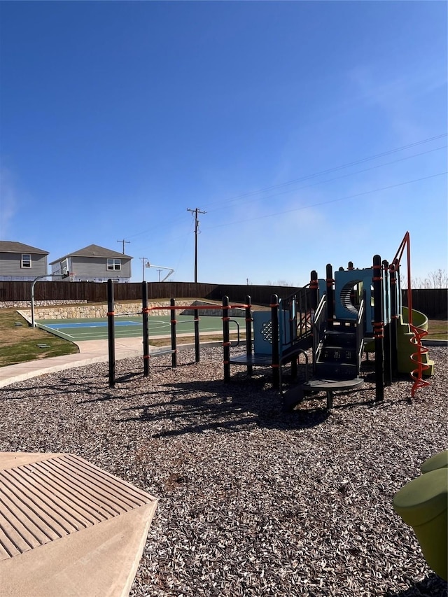 community play area featuring fence
