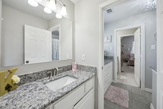 1500 Shropshire St, Keller, TX 76248 - bathroom with vanity and tile patterned floors