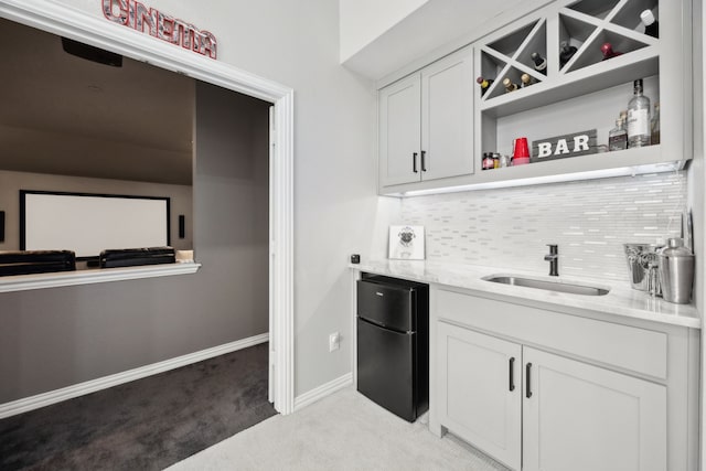 1500 Shropshire St, Keller, TX 76248 - indoor wet bar with freestanding refrigerator, light colored carpet, backsplash, and baseboards