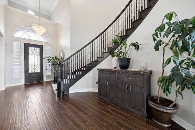 1500 Shropshire St, Keller, TX 76248 - entryway featuring a towering ceiling, stairway, crown molding, baseboards, and dark wood finished floors