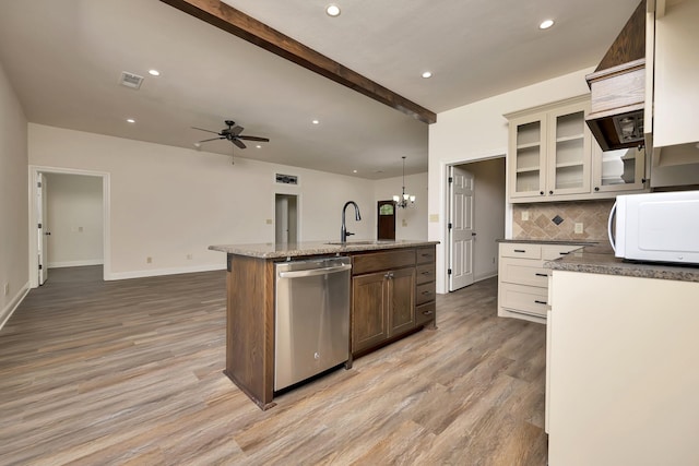 2312 Royce Dr, Arlington, TX 76016 - kitchen with light wood-style flooring, visible vents, a sink, white microwave, and stainless steel dishwasher