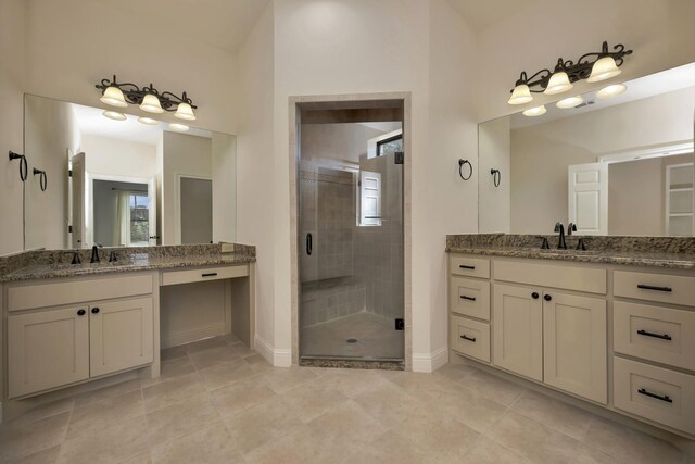 2312 Royce Dr, Arlington, TX 76016 - full bath featuring a shower stall, a sink, and baseboards
