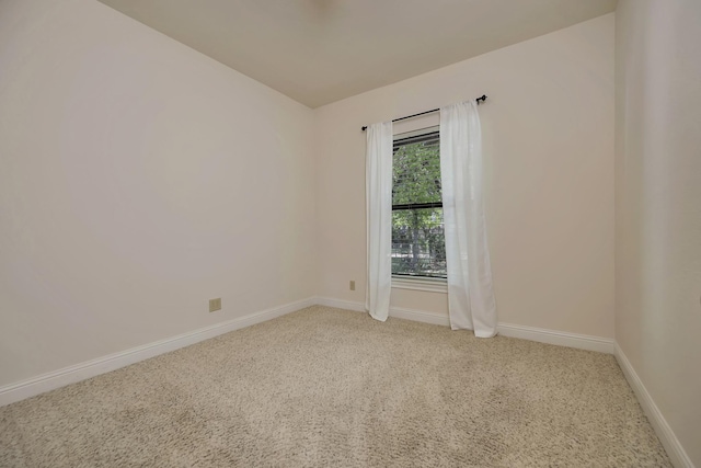2312 Royce Dr, Arlington, TX 76016 - spare room with baseboards and light carpet