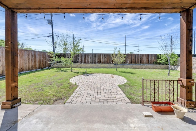 2312 Royce Dr, Arlington, TX 76016 - view of yard featuring a patio and a fenced backyard