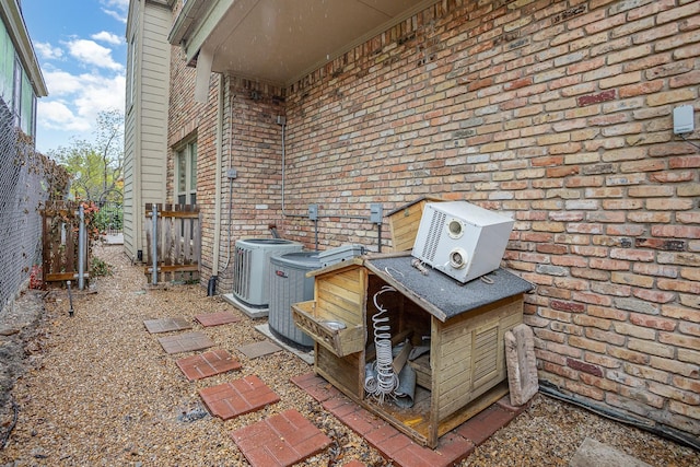 3422 Lovers Ln Unit A, University Park, TX 75225 - view of patio / terrace with central air condition unit and fence