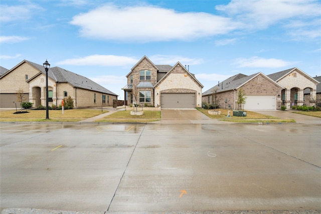 french country inspired facade with a residential view, driveway, stone siding, and a front lawn