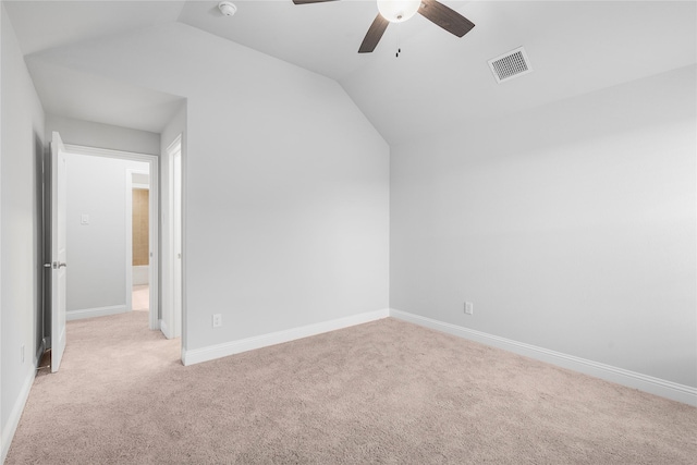 bonus room featuring lofted ceiling, baseboards, carpet flooring, visible vents, and ceiling fan