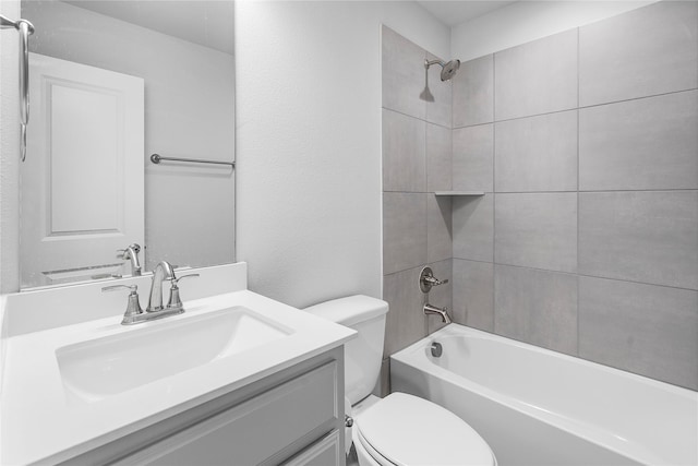 full bathroom with shower / bathtub combination, vanity, and toilet