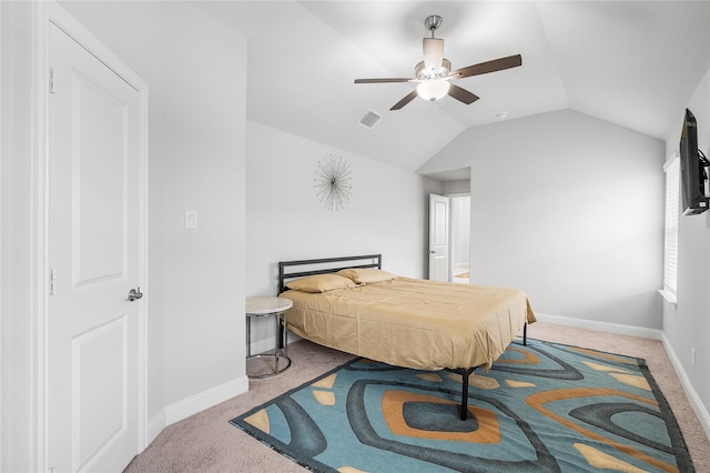 bedroom featuring carpet flooring, baseboards, vaulted ceiling, and visible vents