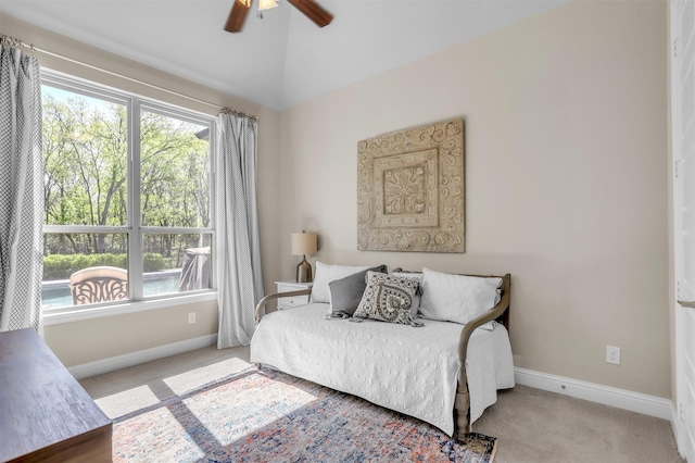bedroom featuring ceiling fan, baseboards, vaulted ceiling, and carpet floors