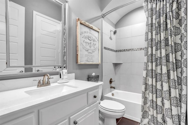 full bath with shower / bath combo, toilet, and vanity