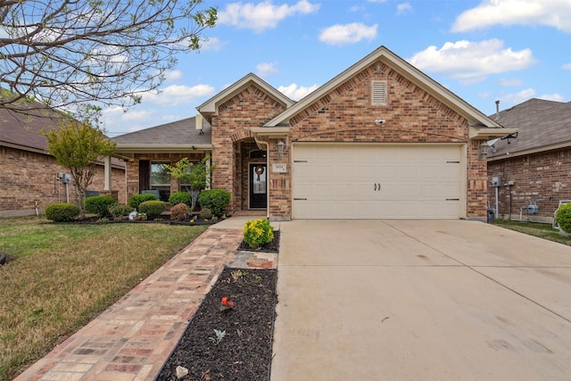 5929 Black Bass Dr, Fort Worth, TX 76179 - view of front of house featuring a shingled roof, an attached garage, brick siding, a front lawn, and driveway
