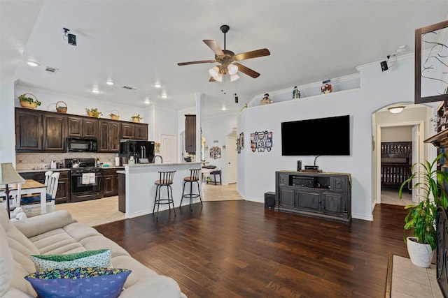 5929 Black Bass Dr, Fort Worth, TX 76179 - living room with ceiling fan, ornamental molding, visible vents, recessed lighting, and light wood finished floors