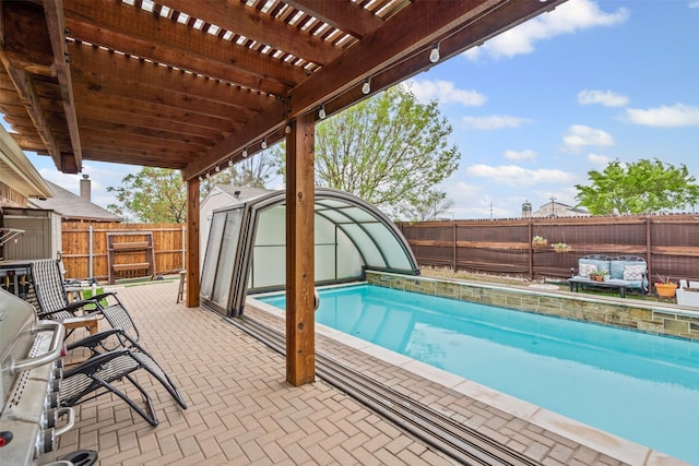 5929 Black Bass Dr, Fort Worth, TX 76179 - view of swimming pool with a pergola, a patio area, a fenced backyard, an outdoor structure, and a fenced in pool